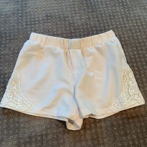white shorts with lace on the side